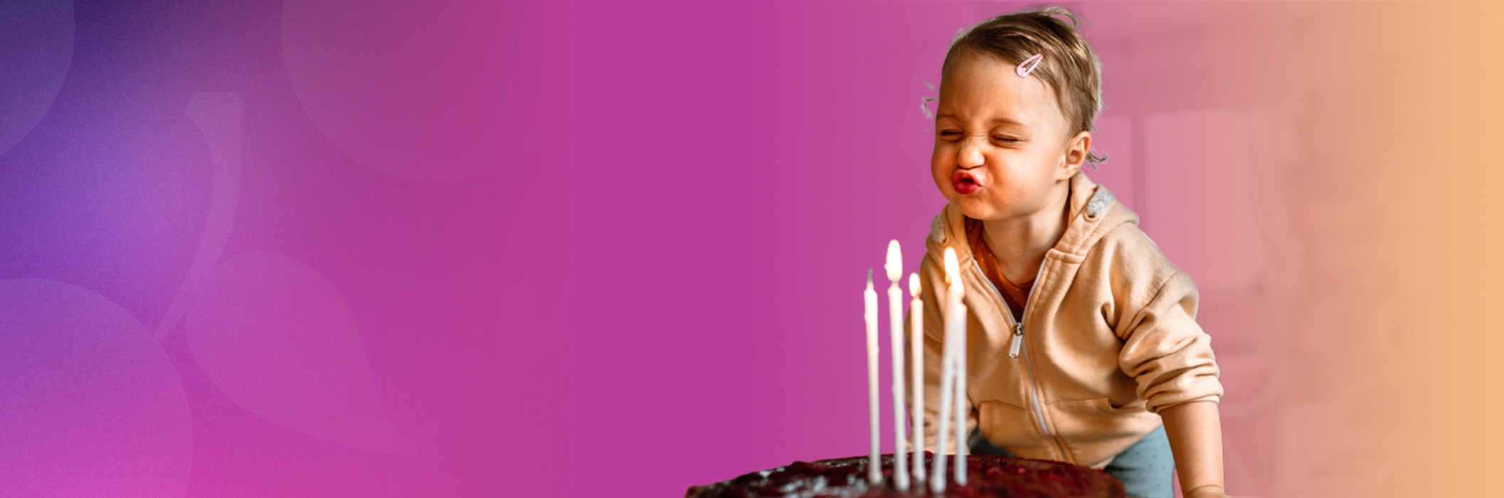 Child blowing out candles